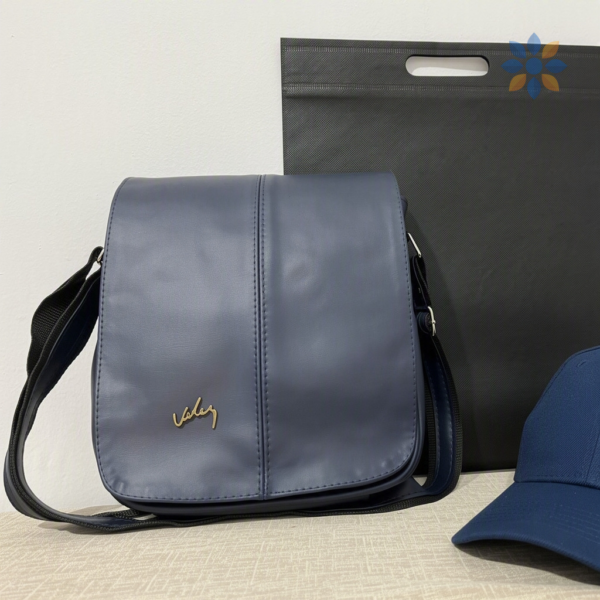 Duo Vélez Bolso Carriel 27 cm + Gorra + Bolsa Estilo
