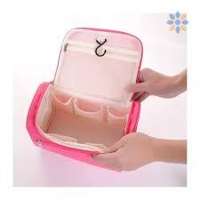 Bolsa de aseo colgante rosa con múltiples compartimentos